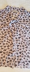 Sleeveless tie-front bow print blouse